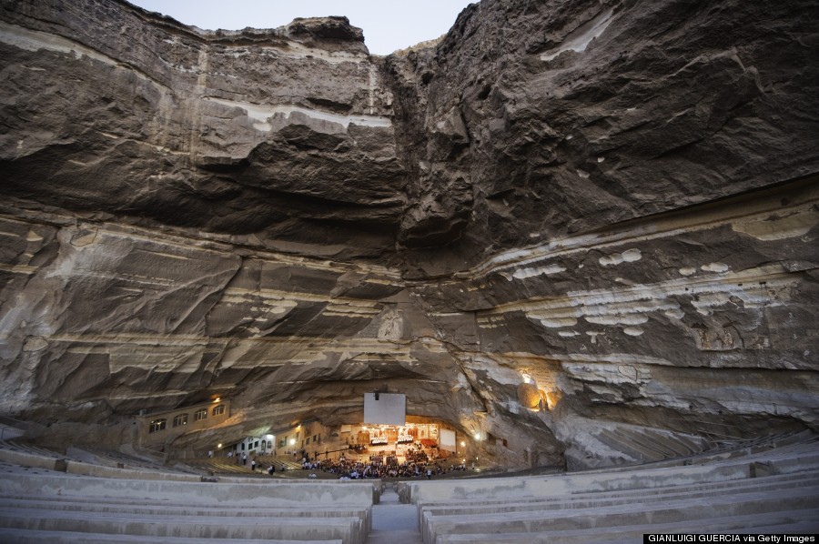 A general view of St Samaans (Simon) Church also known as the Cave Church in the Mokattam village, nicknamed as "Garbage City," is seen on July 26, 2012 in Cairo. Once a week hundreds gather at the Cave Church in Moqattam, after the prayer, a coptic priest performs exorcism or healing blessing to some of the believers. With a cross and holy water he fights spiritual entities and demons. The Monastery of St. Simon the Tanner is the largest and it has an amphitheater with a seating capacity of 20,000 making it the largest church in the Middle East. It is named after the Coptic Saint, Simon the Tanner, who lived at the end of the 10th century, when Egypt was ruled by the Muslim Fatimid Caliph Al-Muizz Lideenillah. Simon the Tanner is the Coptic Saint who is associated with the legend of the moving of the Mokattam Mountain. AFP PHOTO/GIANLUIGI GUERCIA (Photo credit should read GIANLUIGI GUERCIA/AFP/Getty Images)